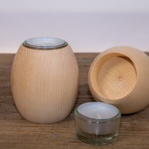 zwei kugelteelichter liegend